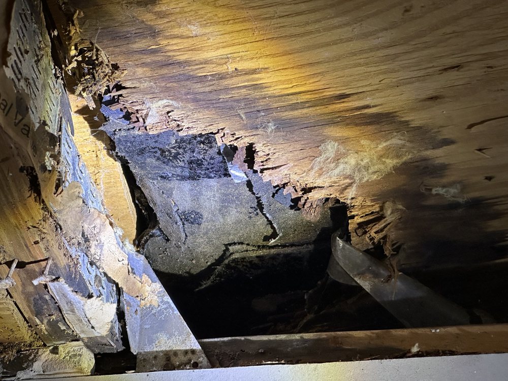 Slide of Wizard Roofing