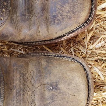 COBBLER EXPRESS - Top of boot showing old stitch and new black stitch, notice the perfect lines. - Shoe Repair Near Me - Hesperia, California COBBLER EXPRESS - Top of boot showing old stitch and new black stitch, notice the perfect lines. - Shoe Repair Near Me - Hesperia, California