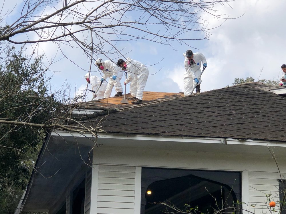 Slide of Restoration Roofing KE