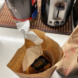 KFC - Popcorn chicken delivered with crumpled paper towel in container after asking for our order to be completed rather than receiving credit