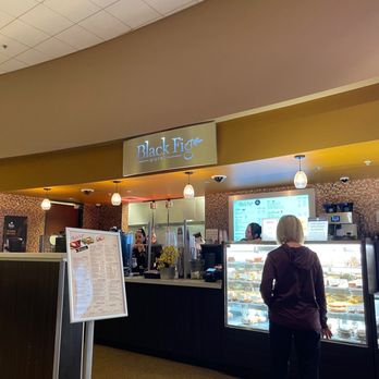 Black Fig Coffee & Bistro - a woman standing in front of the counter - Cafes Near Me - Scottsdale, Arizona Black Fig Coffee & Bistro - a woman standing in front of the counter - Cafes Near Me - Scottsdale, Arizona