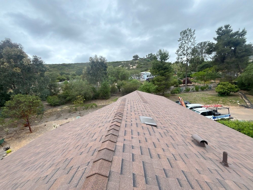 Slide of Triark Roofing