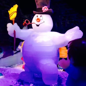 ICE! - Frosty the snowman, hand-carved ice sculptures, including two-story tall ice slides. The girls loved sliding down! - Amusement Parks Near Me - Grapevine, Texas