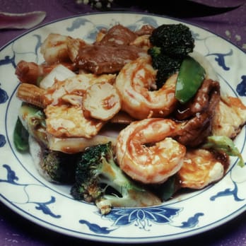 Hong Kong - a plate of shrimp, broccoli, and mushrooms - Chinese Near Me - New York, New York Hong Kong - a plate of shrimp, broccoli, and mushrooms - Chinese Near Me - New York, New York