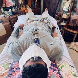 Debi McKee's Crystal Healing Mermaid Cottage - Client receiving a Crystal Energy Healing long session, channeling