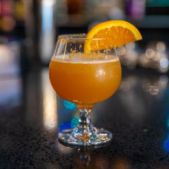 Prime 623 - a glass of orange juice on a bar - Bars Near Me - Brooklyn, New York Prime 623 - a glass of orange juice on a bar - Bars Near Me - Brooklyn, New York