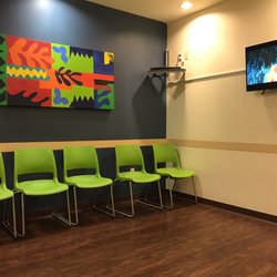 Arizona Pediatric Eye Specialists - Waiting area. Disney movie playing for the kiddos.