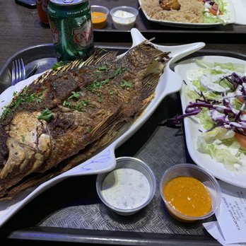 Kandahar Kabab - Close up of the fish and choice of side (salad). I wish the mixed veggies were allowed with this combo. - Halal Near Me - Toronto, Ontario