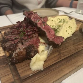 Lemon & Thyme - Steak and mash potatoes with sauce on side - New American Near Me - Costa Mesa, California Lemon & Thyme - Steak and mash potatoes with sauce on side - New American Near Me - Costa Mesa, California