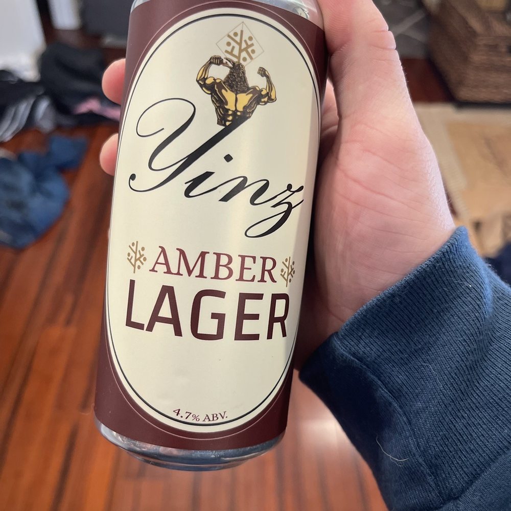 Homaide Brewing - a person holding a can of beer - Breweries Near Me - Williamsport, Maryland