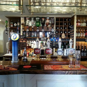 Bell Inn - Part of the bar. Several beers on tap, wines and liquors - Pubs Near Me - Frome, SOM