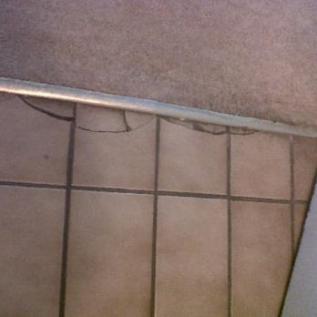 The Busby Hotel - Broken bathroom floor - Hotels Near Me - Glasgow, GLG