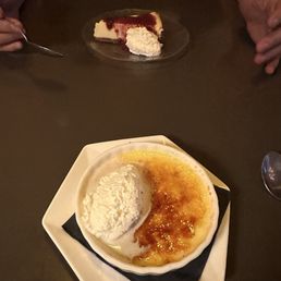 Crème Brûlée and Lemon Tarte with raspberry sauce Crème Brûlée and Lemon Tarte with raspberry sauce