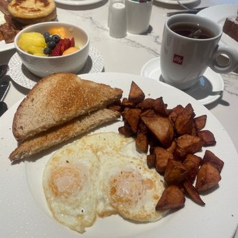 Café la Vie - Eggs, toast, fruit, and Breakfast Potato Medley - Bars Near Me - St. Louis, Missouri Café la Vie - Eggs, toast, fruit, and Breakfast Potato Medley - Bars Near Me - St. Louis, Missouri