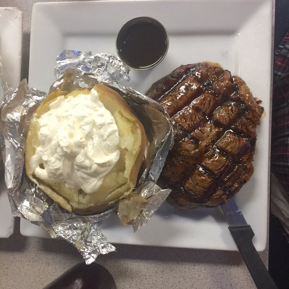 Annie's - 16oz Ribeye and monstrous baked potato. - New American Near Me - Enterprise, Alabama Annie's - 16oz Ribeye and monstrous baked potato. - New American Near Me - Enterprise, Alabama
