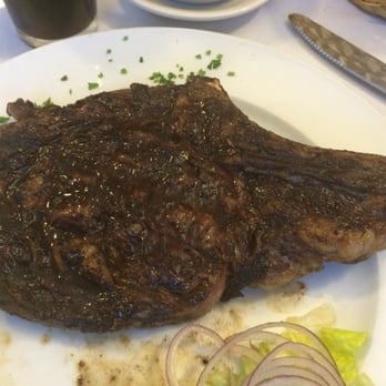 Tango Argentinian Steakhouse - Bone-in Ribeye Steak! Try it with the chimichurri! Outstanding! - Steakhouses Near Me - Central Islip, New York Tango Argentinian Steakhouse - Bone-in Ribeye Steak! Try it with the chimichurri! Outstanding! - Steakhouses Near Me - Central Islip, New York