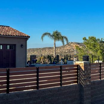Reyes Landscape Maintenance - Hardscape and fencing on custom garage. - Landscaping Near Me Reyes Landscape Maintenance - Hardscape and fencing on custom garage. - Landscaping Near Me