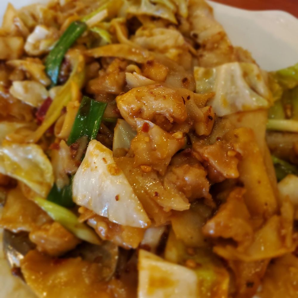 Chow mein with chicken and hand cut noodles Chow mein with chicken and hand cut noodles