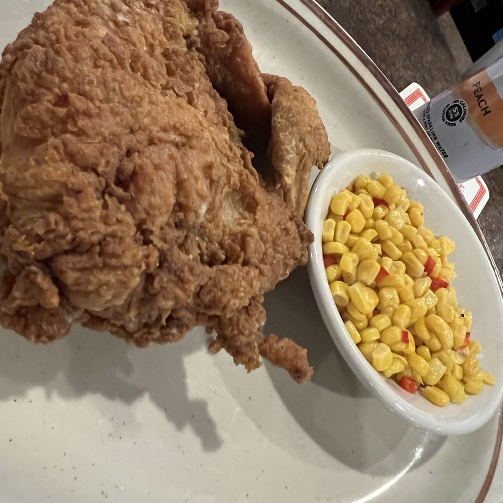 1/4 white chicken with corn. Potatoes arrived on a separate plate.