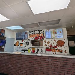 Chick N' Seafood Spot - The new mural behind the counter-- so cute!
