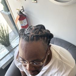 Mechele's Wellness Spa - Men's loc maintenance and style