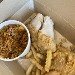 Jojo's Chicken Shack - Chicken with a side of rice and beans.