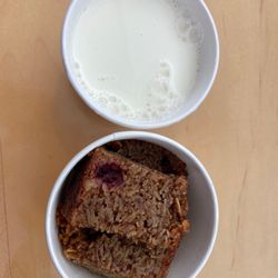 Colectivo Coffee On the Square - Apple Cran Baked Oatmeal - A homey baked oatmeal with sweet apples and tart cranberries. Served with milk.