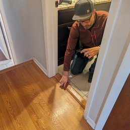 Tim taking a picture of a loose threshold. They noted everything. Tim taking a picture of a loose threshold. They noted everything.