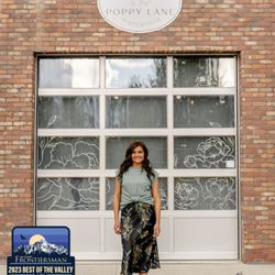 Mauve Street Boutique - Model standing outside storefront
