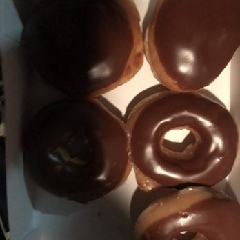 Krispy Kreme - Sorry one's already missing from the half dozen Chocolate glazed and Boston cream - Donuts Near Me - Duluth, Georgia Krispy Kreme - Sorry one's already missing from the half dozen Chocolate glazed and Boston cream - Donuts Near Me - Duluth, Georgia