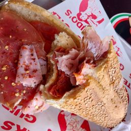 Look at that meat and cheese stuffed into the sandwich. Yum.