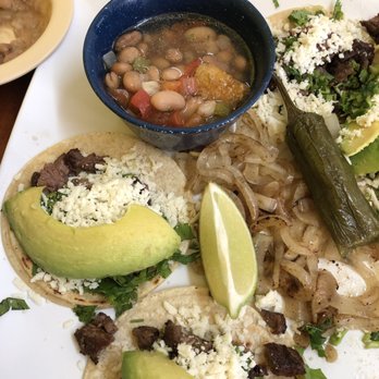 Jalapeno's Cuisine - Beef fajita taquitos and charro beans - Mexican Near Me - El Campo, Texas Jalapeno's Cuisine - Beef fajita taquitos and charro beans - Mexican Near Me - El Campo, Texas