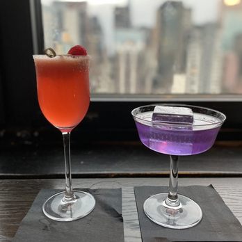 Ophelia - Purple Gin on left is the Purple Tuxedo made with Empress Gin  Left is the Flapper made with Vodka - Cocktail Bars Near Me - New York, New York
