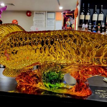 Sakura Fire - a glass fish on a table - Szechuan Near Me - Farmingville, New York Sakura Fire - a glass fish on a table - Szechuan Near Me - Farmingville, New York