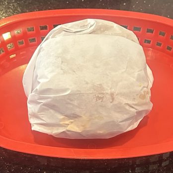 Falafel Corner - Hamburger served wrapped to table. - Mediterranean Near Me - Sacramento, California Falafel Corner - Hamburger served wrapped to table. - Mediterranean Near Me - Sacramento, California
