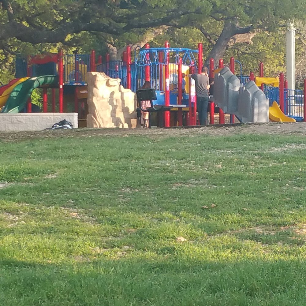 Trailhead Park - Play scape includes rock climbing,  zip lining,  and mini sprinklers - Parks Near Me - Austin, Texas