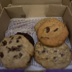 Insomnia Cookies - The two on the left: Vegan Chocolate Chunk Vegan Double Chocolate Chunk  Right: Oatmeal Raisin Chocolate chip
