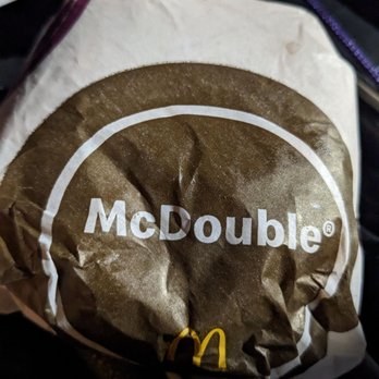 McDonald's - a mcdonald's logo on a brown paper bag - Burgers Near Me - Wesley Chapel, North Carolina