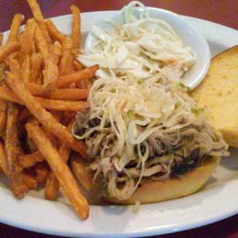 Barnstormer Barbeque - Pulled pork barbeque sandwich with sauerkraut and sweet potato fries with a side of slaw - Barbeque Near Me - Fort Montgomery, New York Barnstormer Barbeque - Pulled pork barbeque sandwich with sauerkraut and sweet potato fries with a side of slaw - Barbeque Near Me - Fort Montgomery, New York