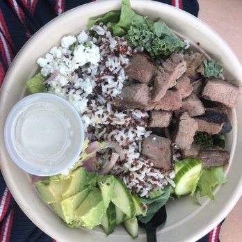 Radish Kitchen - Grain bowl with steak, quinoa and rice, avocado, romaine and kale, cucumber, goat cheese, and yogurt and tahini dressing - Salad Near Me - Nashville, Tennessee