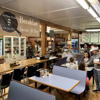 Five Points Market - a woman and a child in a restaurant - American Near Me - Pulaski, Tennessee
