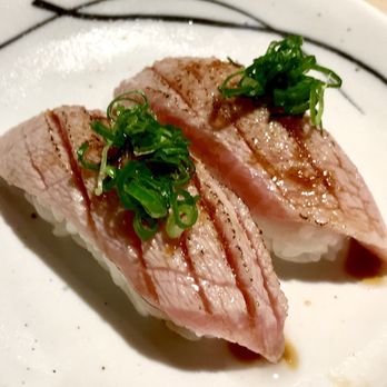 Izakaya Uosan - Aburi Otoro nigiri topped w green onion, everything brushed w the chef's nikiri. - Izakaya Near Me - Honolulu, Hawaii