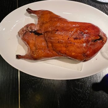 Mott 32 - The roasted duck. They will slice it for you table side and served with sauces and thin pancakes to make lil tacos to eat. - Chinese Near Me - Las Vegas, Nevada Mott 32 - The roasted duck. They will slice it for you table side and served with sauces and thin pancakes to make lil tacos to eat. - Chinese Near Me - Las Vegas, Nevada