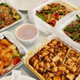 a variety of asian food in containers a variety of asian food in containers