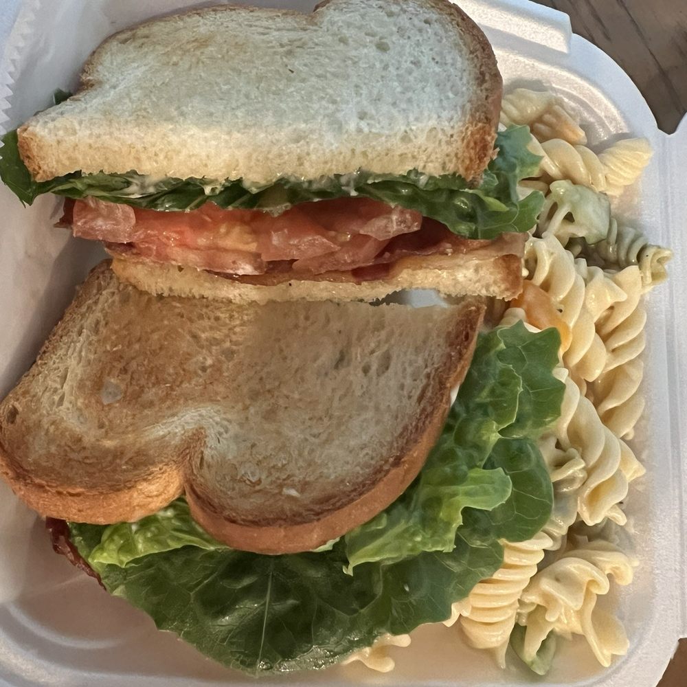 Delizio - BLT on toasted white bread side of pasta salad - Delis Near Me - Flowery Branch, Georgia Delizio - BLT on toasted white bread side of pasta salad - Delis Near Me - Flowery Branch, Georgia