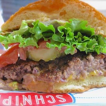 Schnipper's - Seldom does a cooked through burger still come out this juicy. More pics here http://bangforyourburgerbuck.com/schnippers-quality-kitchen-ne - American Near Me - New York, New York