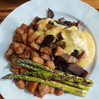 The Continental - Brisket Benedict with very delicious home fries - American Near Me - Richmond, Virginia The Continental - Brisket Benedict with very delicious home fries - American Near Me - Richmond, Virginia