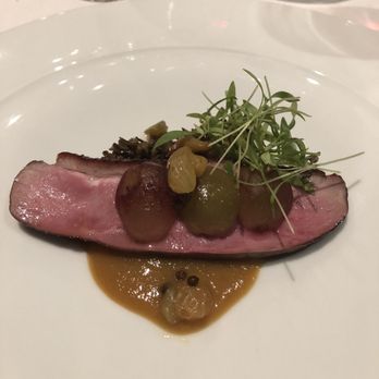 The Kitchen Restaurant - Peking Duck Breast "Prepared as Ham" with Peony Grapes, Golden Raisin-Coriander Coulis and Wild Rice à l'étuvée - New American Near Me - Sacramento, California The Kitchen Restaurant - Peking Duck Breast "Prepared as Ham" with Peony Grapes, Golden Raisin-Coriander Coulis and Wild Rice à l'étuvée - New American Near Me - Sacramento, California