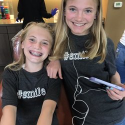 Smile Doctors Orthodontics - Georgetown - Lillix getting her bottom braces and her sister Analeese showing support