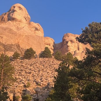 Mount Rushmore National Memorial - the view from the presidential trail at 7 am sunrise. - Landmarks & Historical Buildings Near Me - Keystone, South Dakota Mount Rushmore National Memorial - the view from the presidential trail at 7 am sunrise. - Landmarks & Historical Buildings Near Me - Keystone, South Dakota